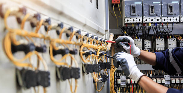 Professional Electrician technician working in Emory, TX